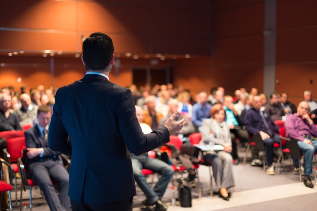 man speaking at a business conference picture id499517325
